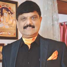 Ramesh Menon,  Director