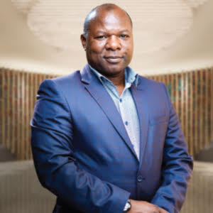 Dr. Nathan Chikono,    Group Chief Executive Officer, Champions Holdings
